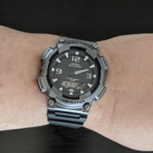 close-up of casio solar watch on man's wrist